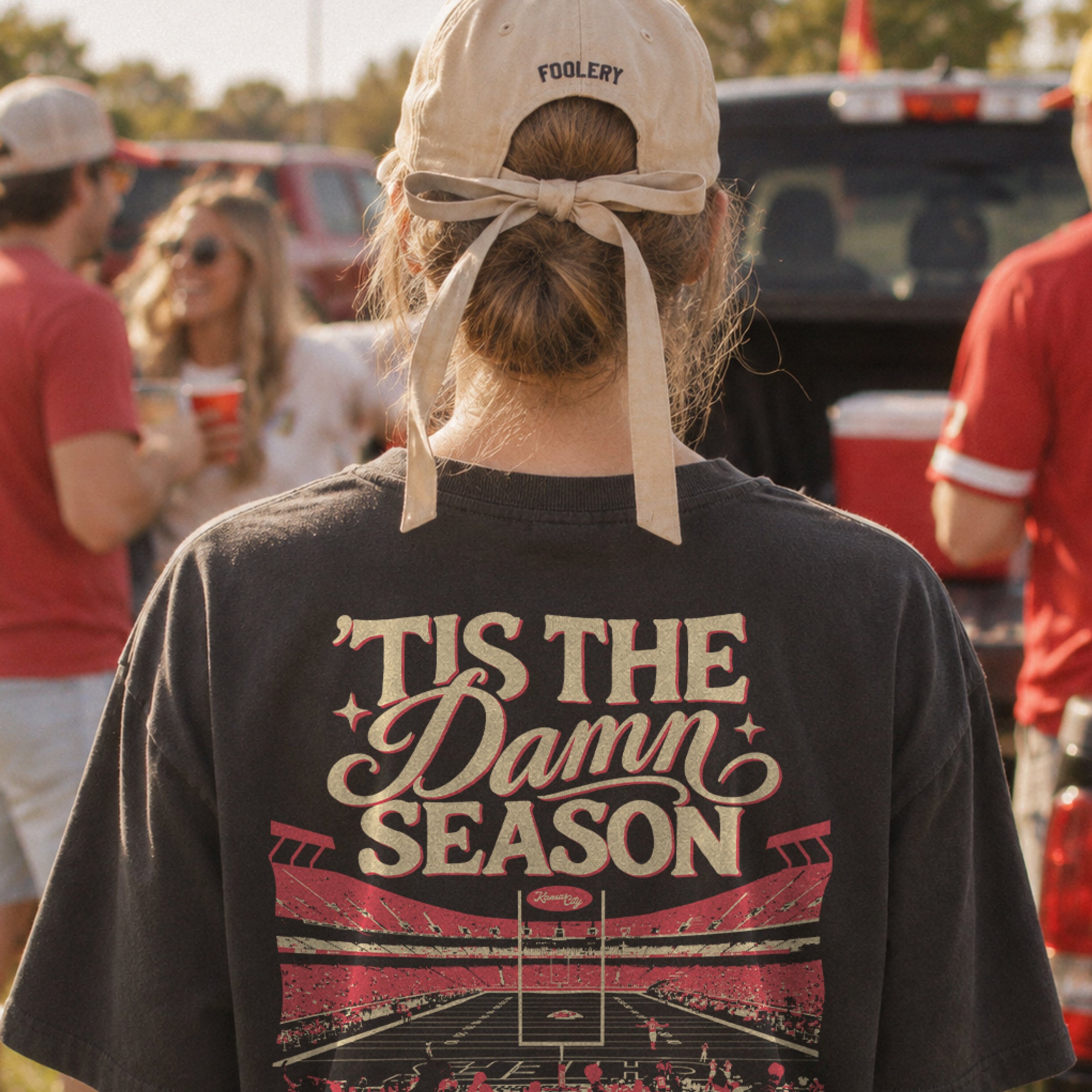 ’Tis the Damn Season Kansas City Stadium Tee in Graphite, back, on model