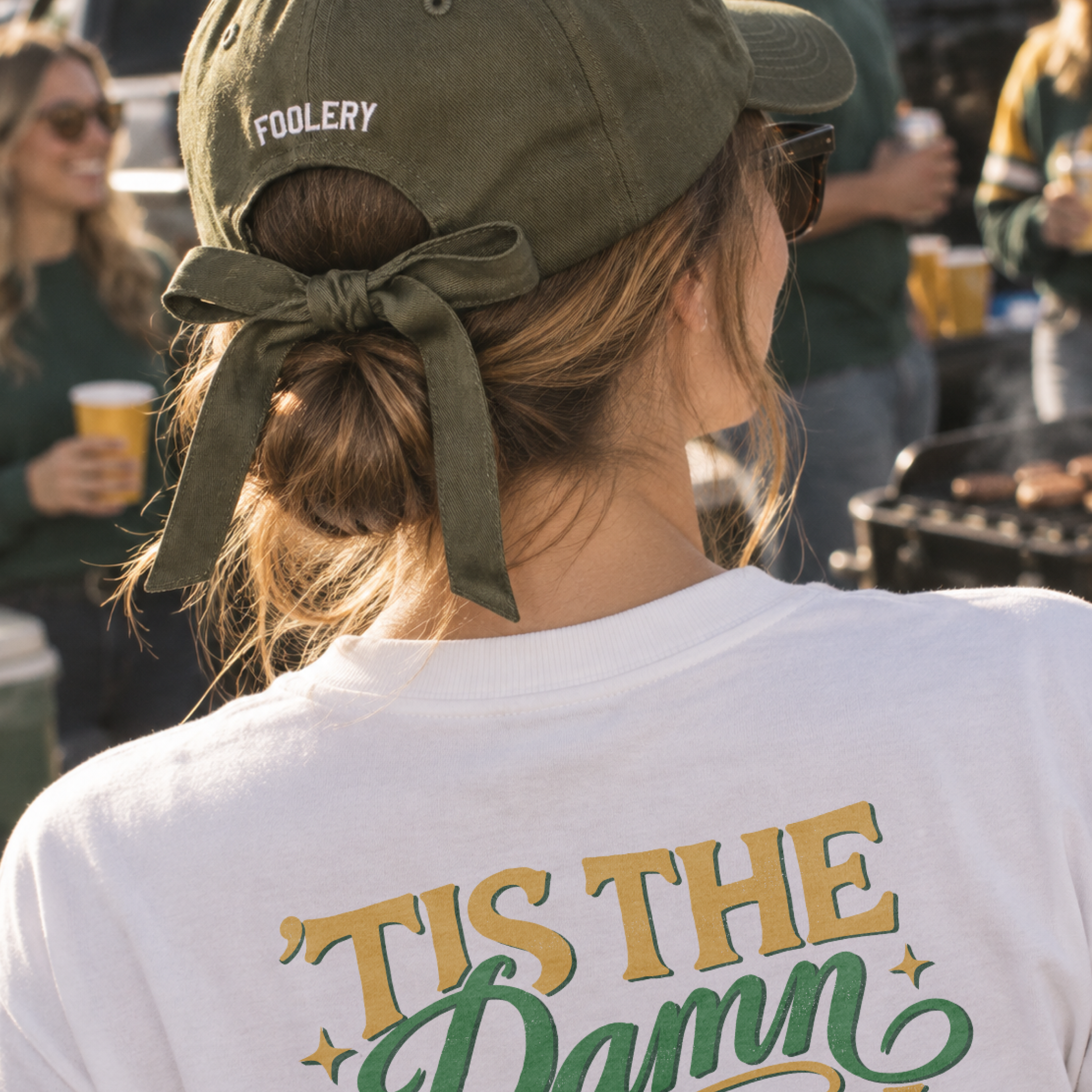 ’Tis the Damn Season Green Bay Tee in Ivory, on model, back
