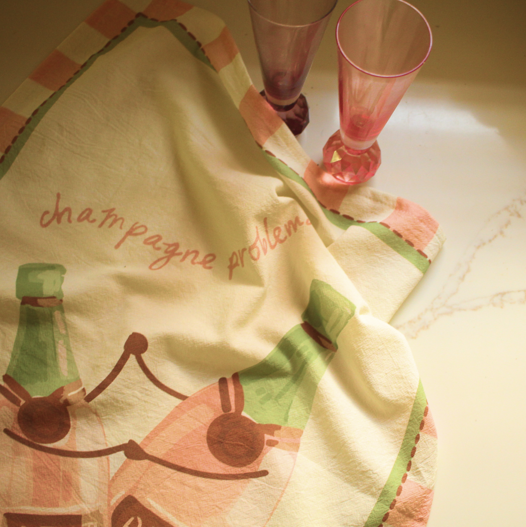 The Champagne Problems Tea Towel