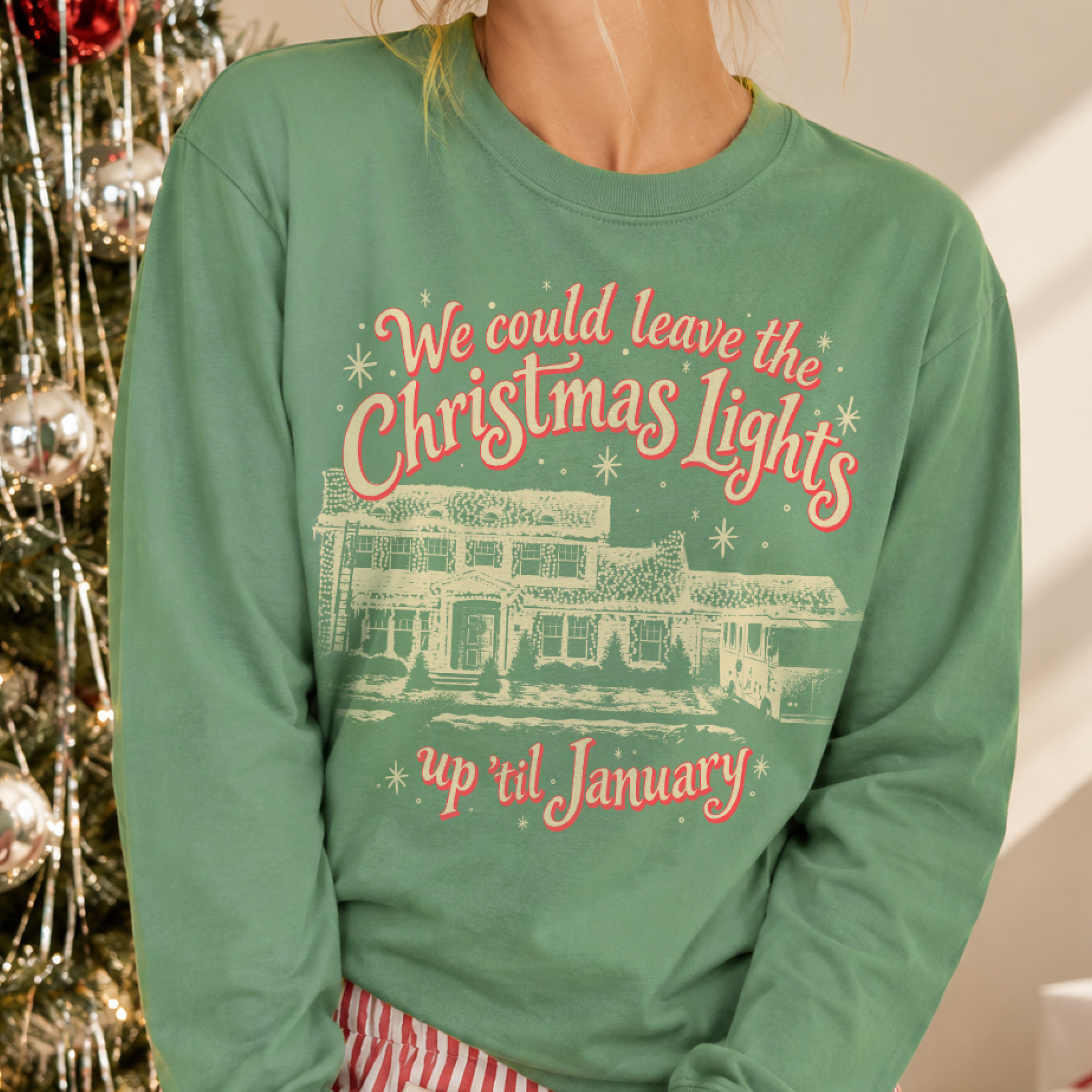 Christmas Lights 'Til January Crewneck in Light Green, on model