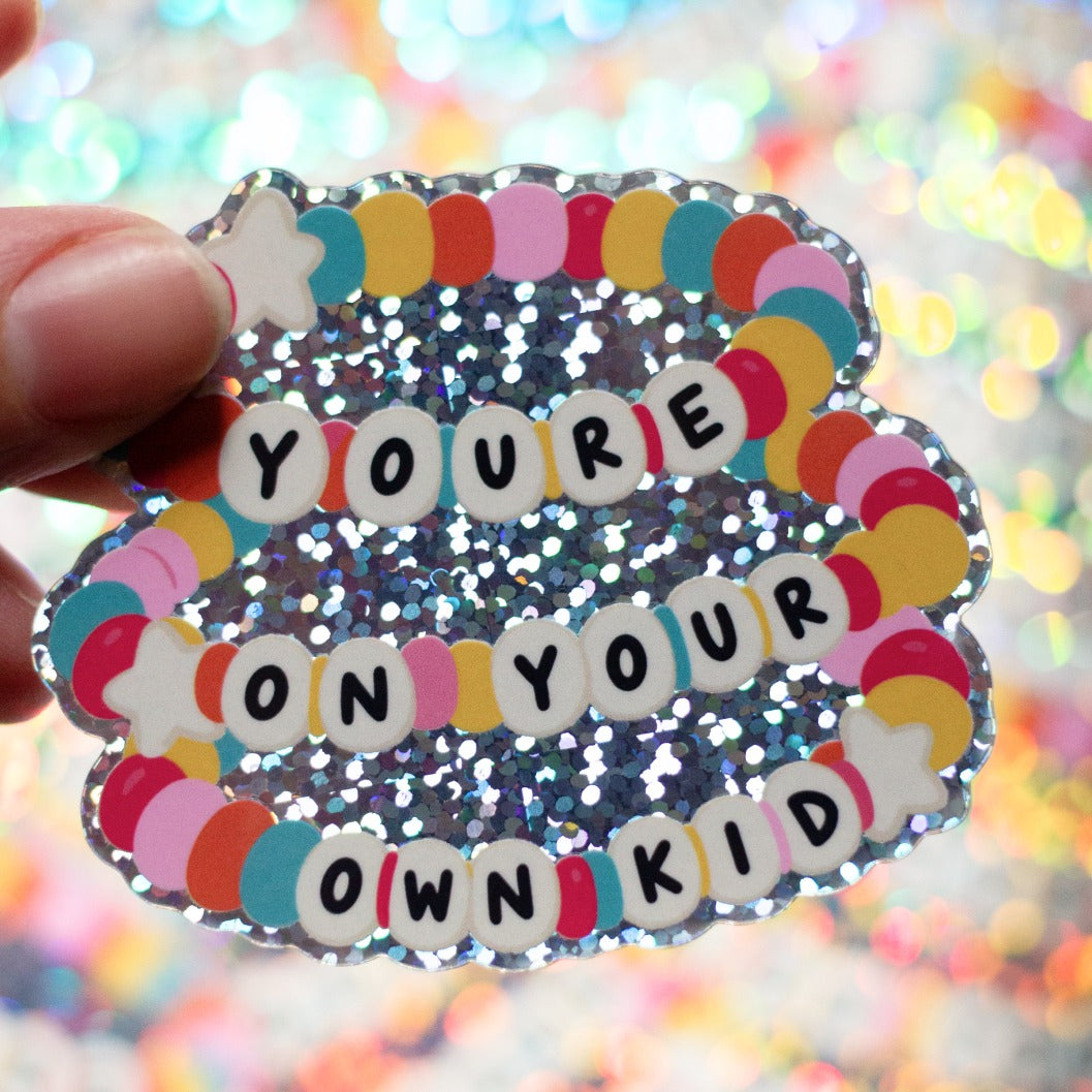 You're On Your Own Kid glitter sticker catching the light