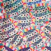 Pile of You're On Your Own Kid glitter stickers