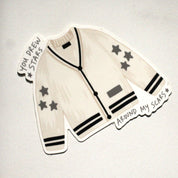 You Drew Stars cardigan sticker on marble