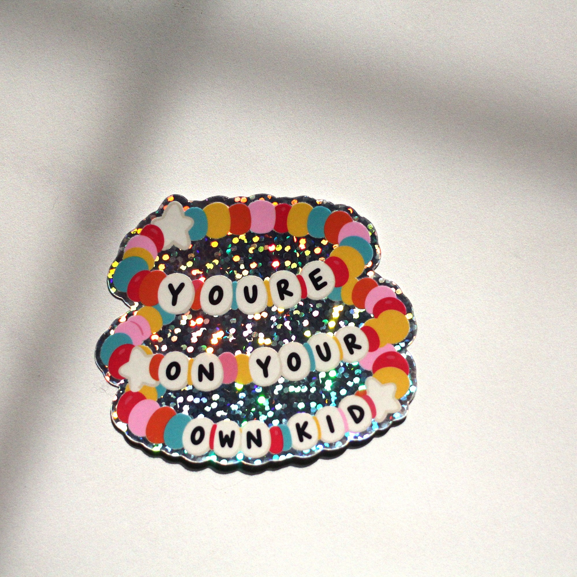 You're On Your Own Kid friendship bracelet glitter sticker on marble